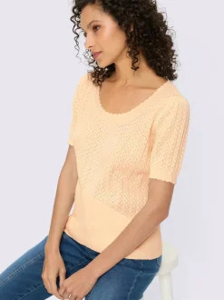 Pull à manches courtes avec motif ajouré et bord ondulé