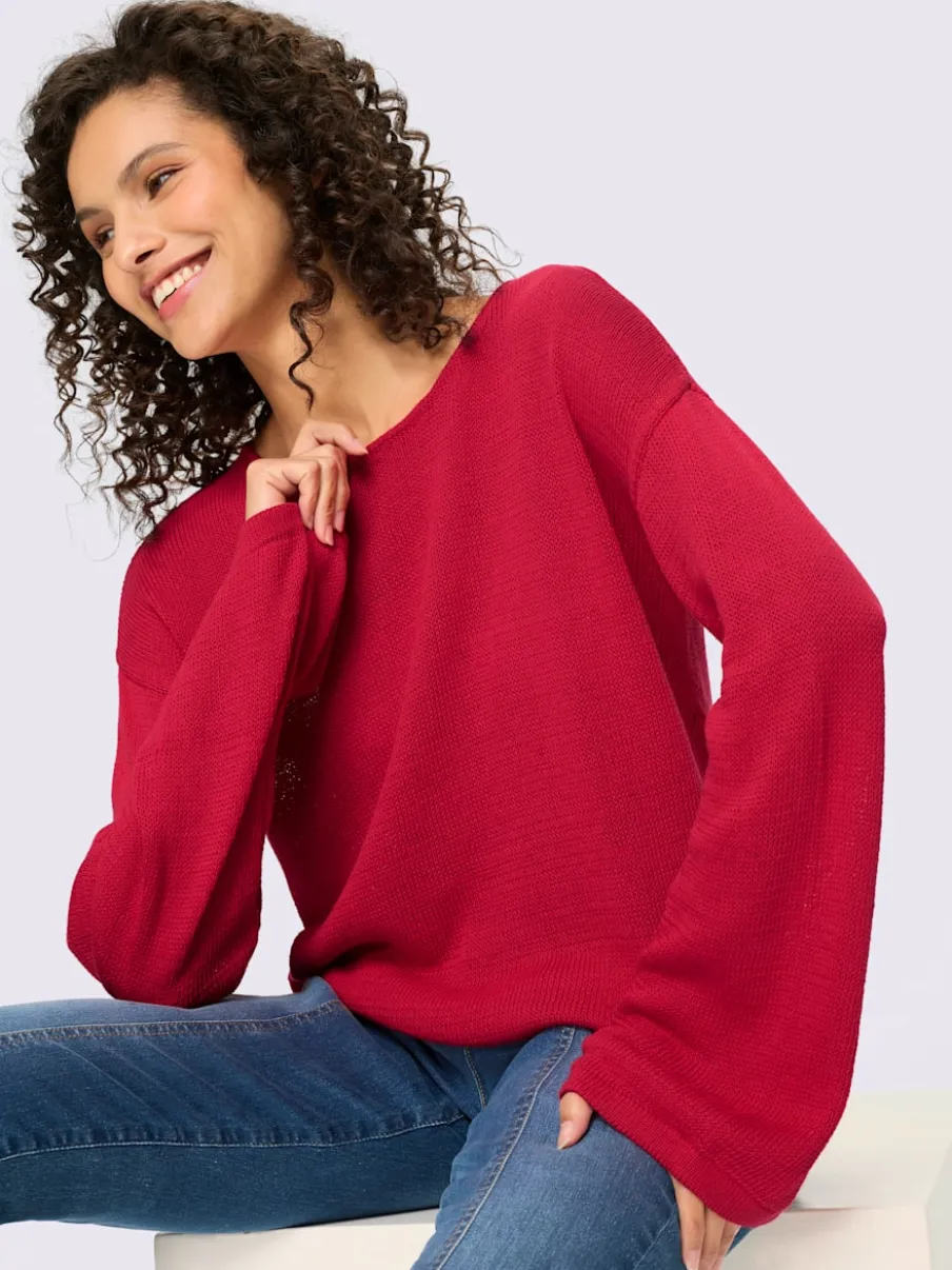 Pull à manches longues avec encolure ronde et manches trompette