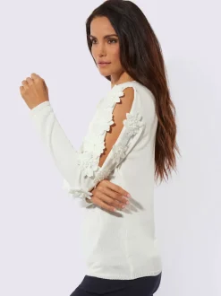Pull à manches longues avec fleurs en relief aux épaules