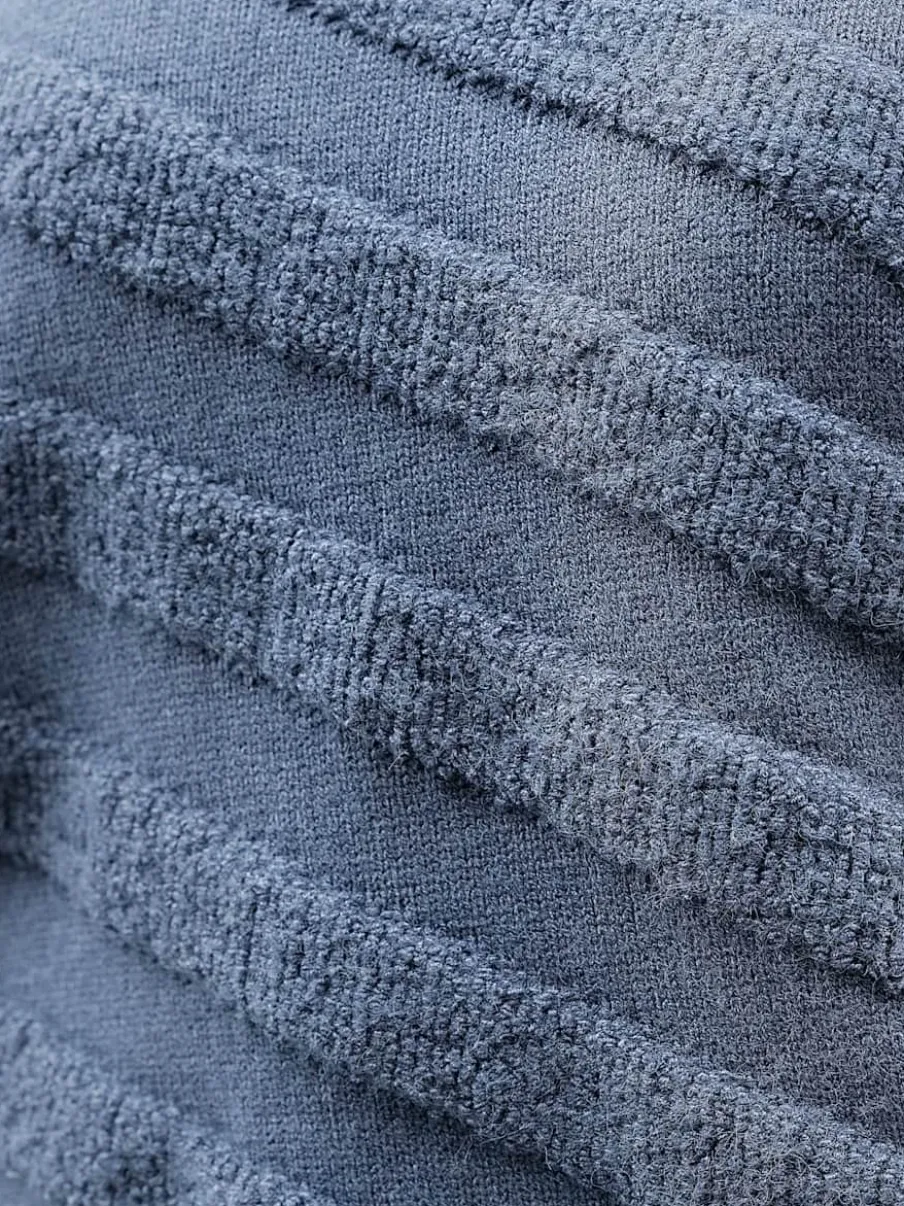 Pull superbe mélange de matières