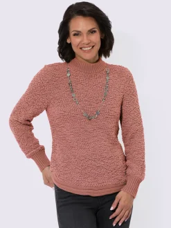 Pull tricoté doux avec col montant et finitions côtelées