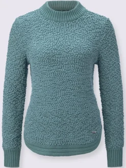 Pull tricoté doux avec col montant et finitions côtelées