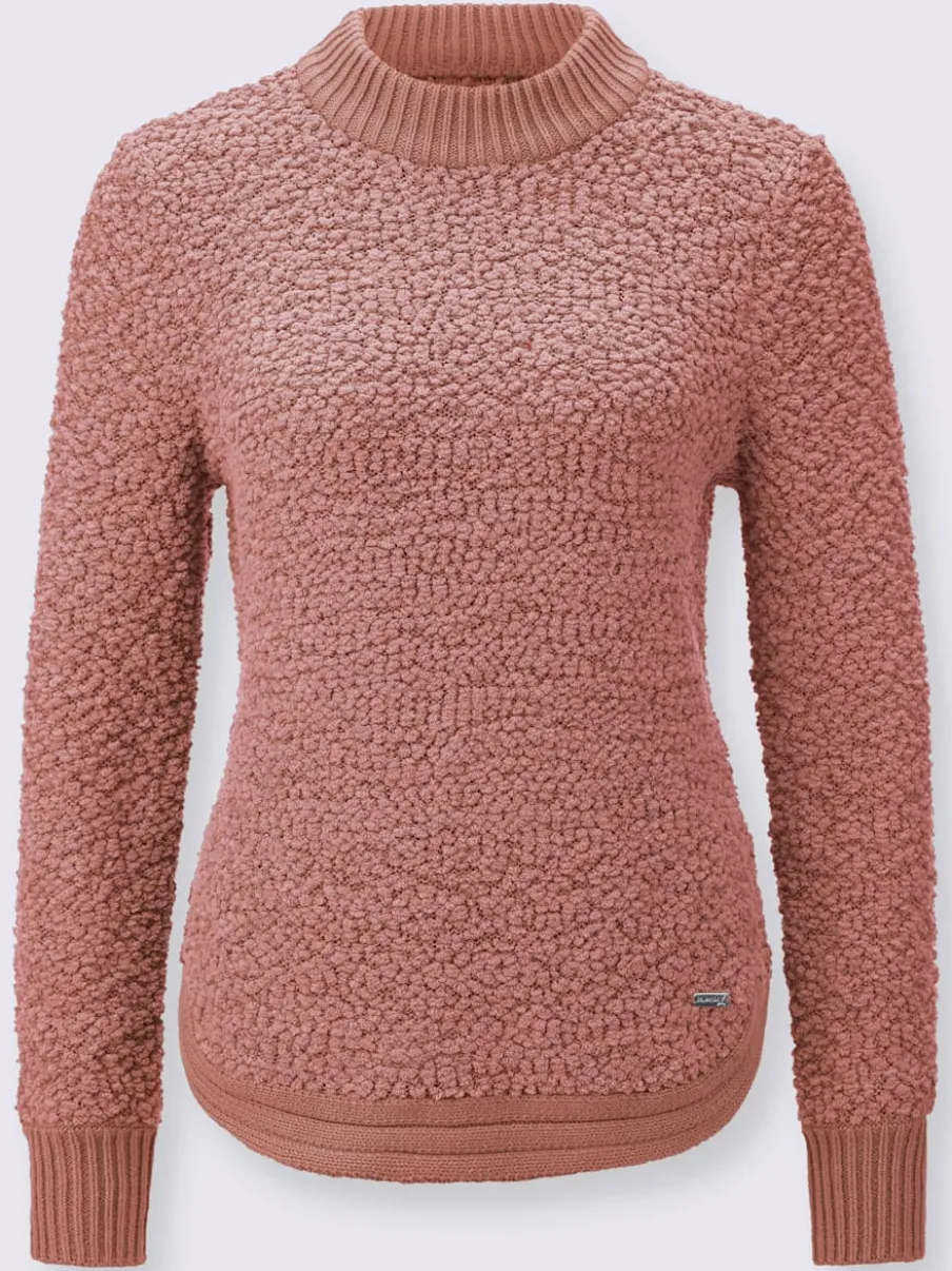 Pull tricoté doux avec col montant et finitions côtelées