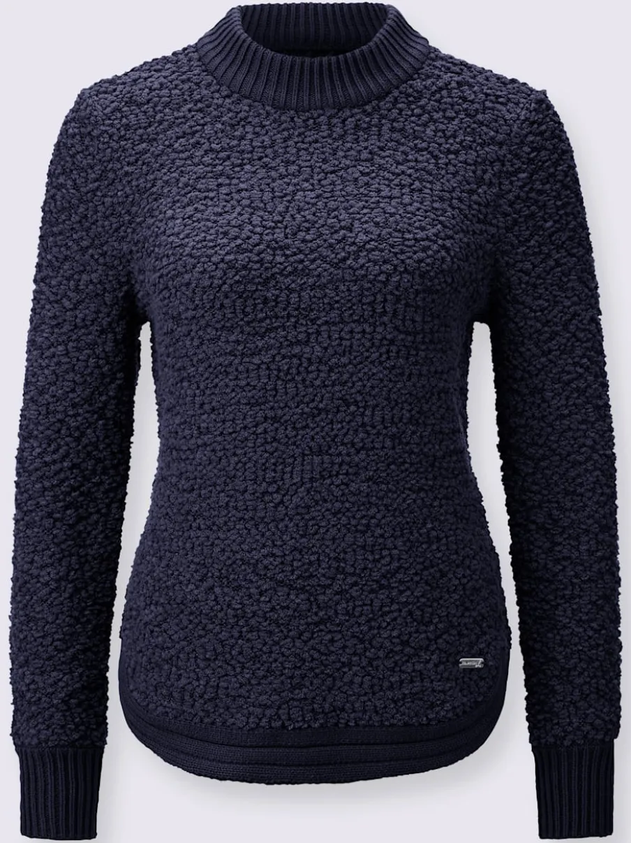 Pull tricoté doux avec col montant et finitions côtelées