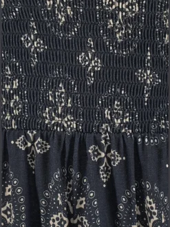 Robe bustier courte à motifs ethniques avec haut smocké