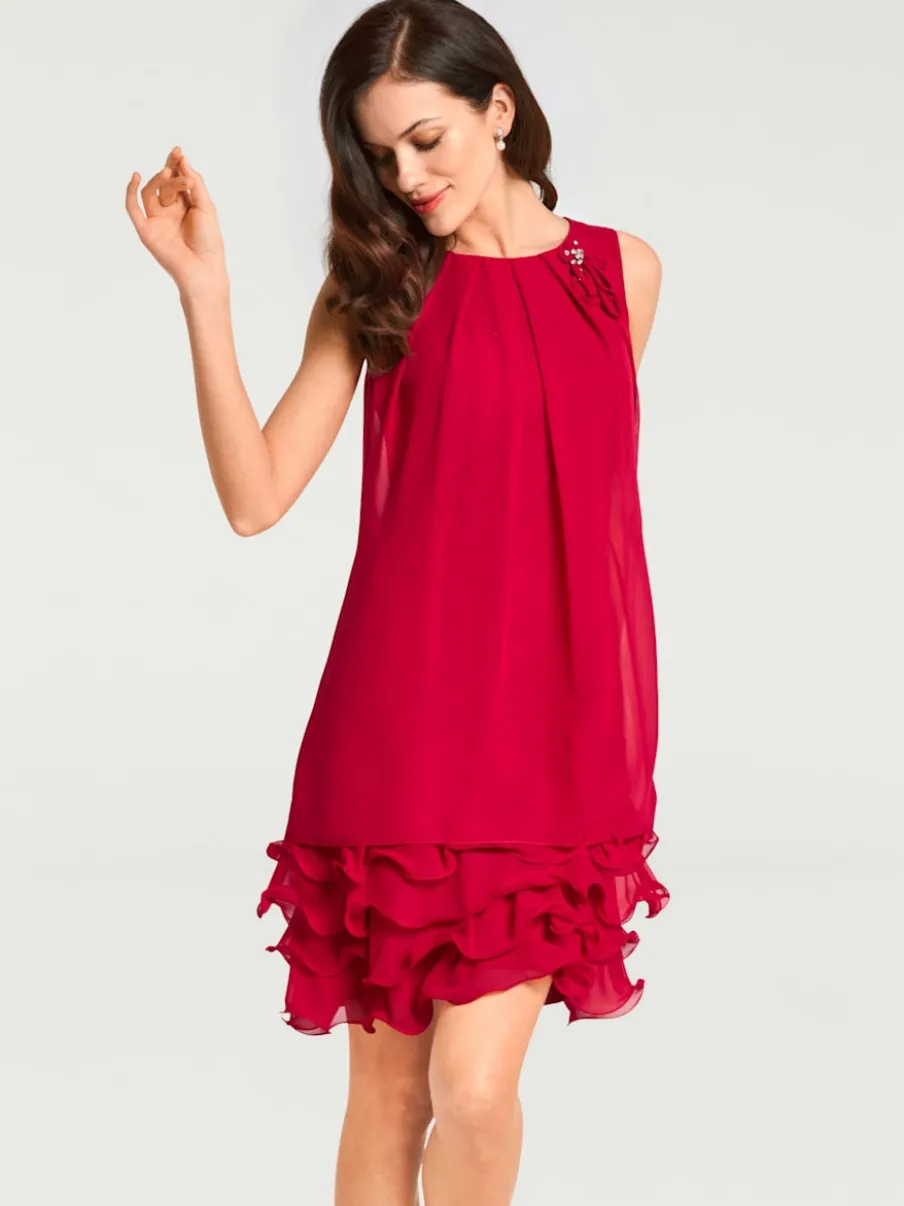 Robe de cocktail à encolure ronde et sans manches avec volants