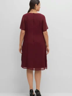 Robe de cocktail look superposé féminin