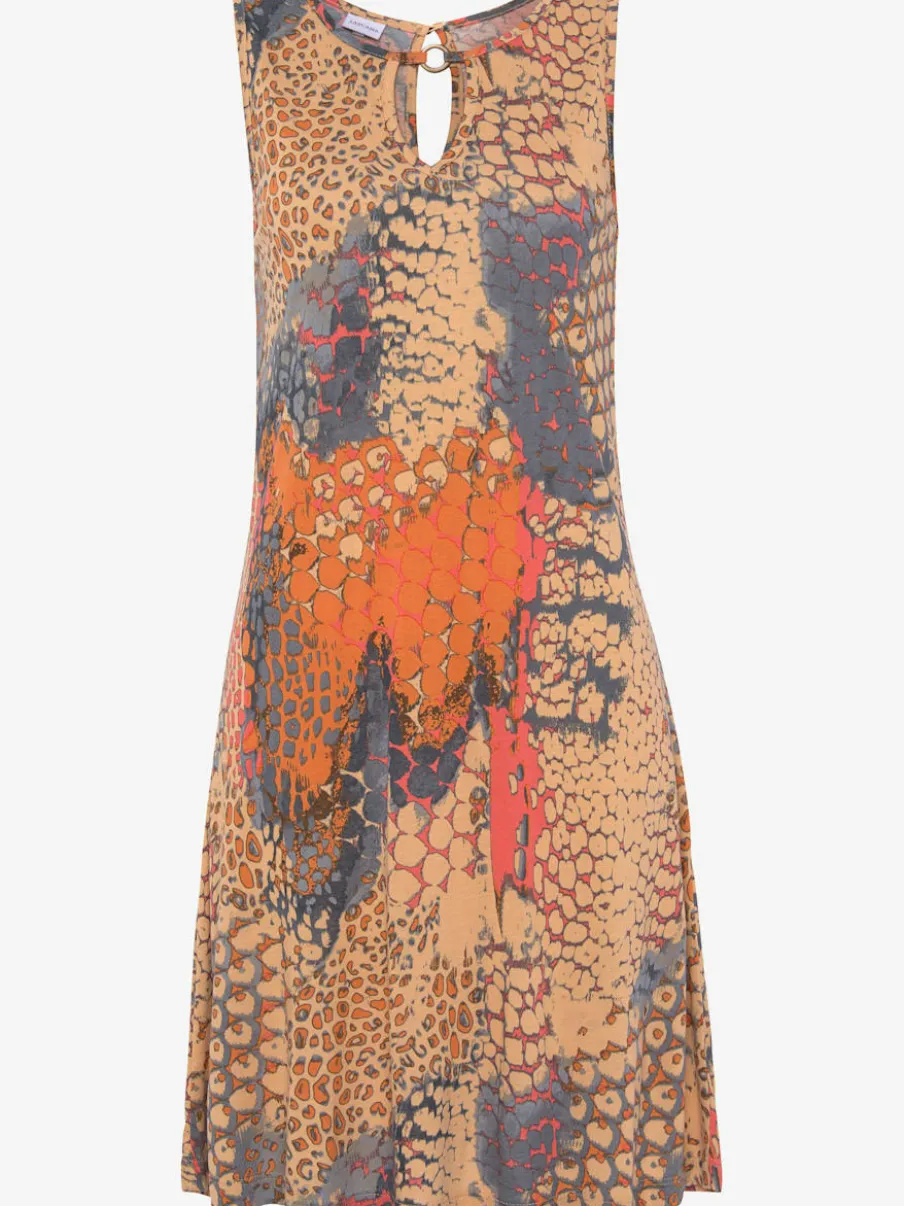 Robe de plage avec accessoire décoratif à l'encolure