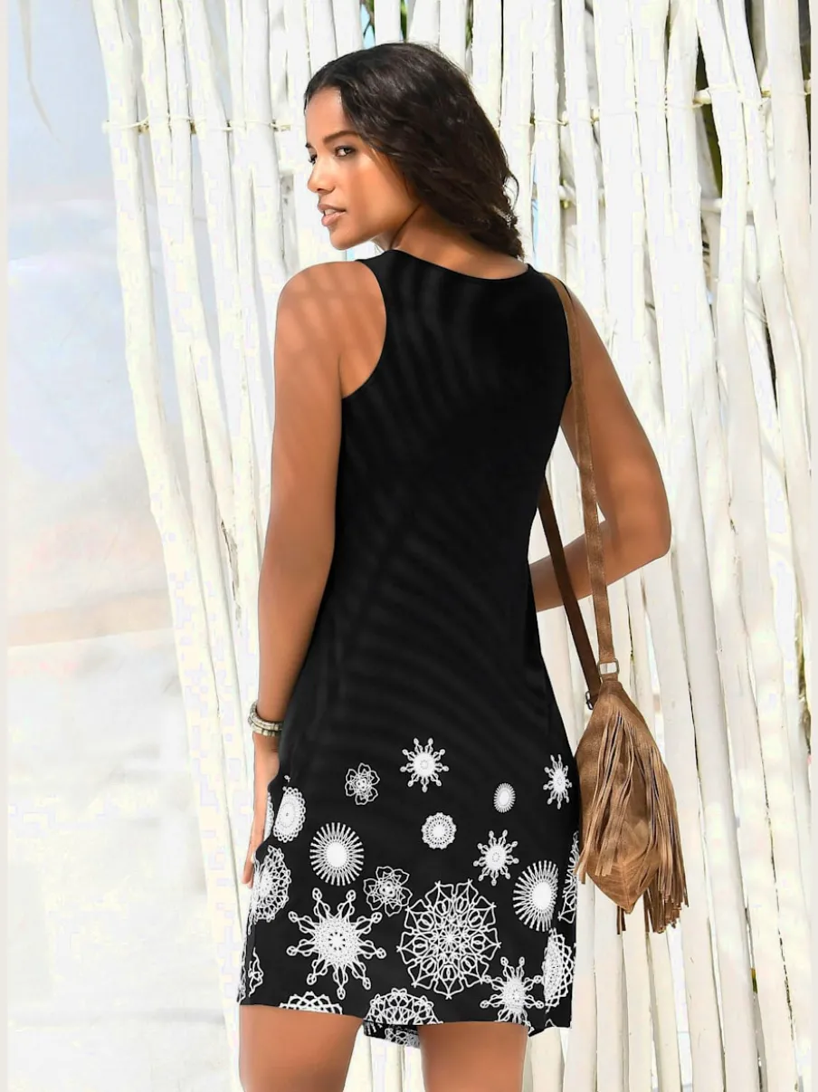 Robe de plage avec plis et jolis motifs imprimés