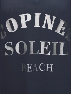 Robe de plage encolure avec bords-côtes légèrement brillants grâce au fil lurex