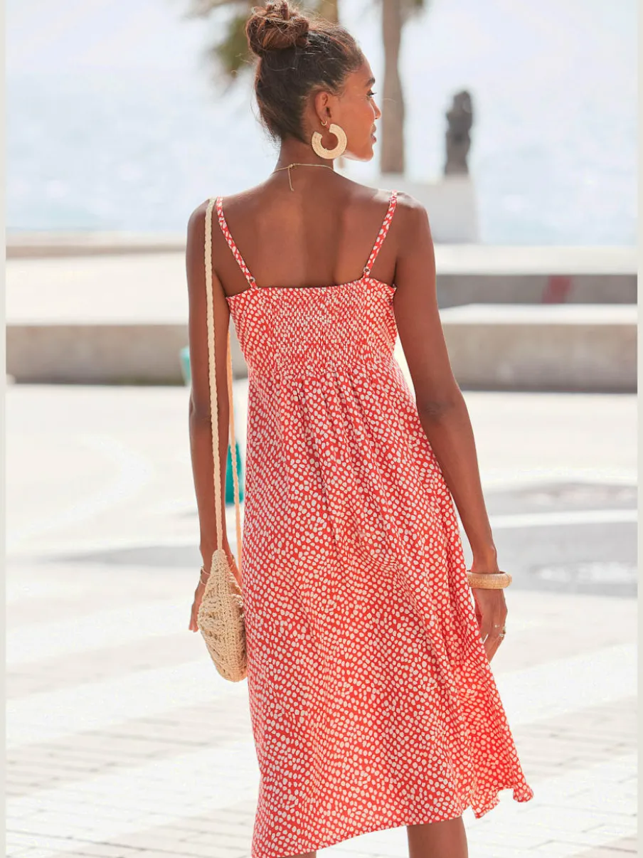 Robe d'été avec bretelles spaghetti et patte boutonnage