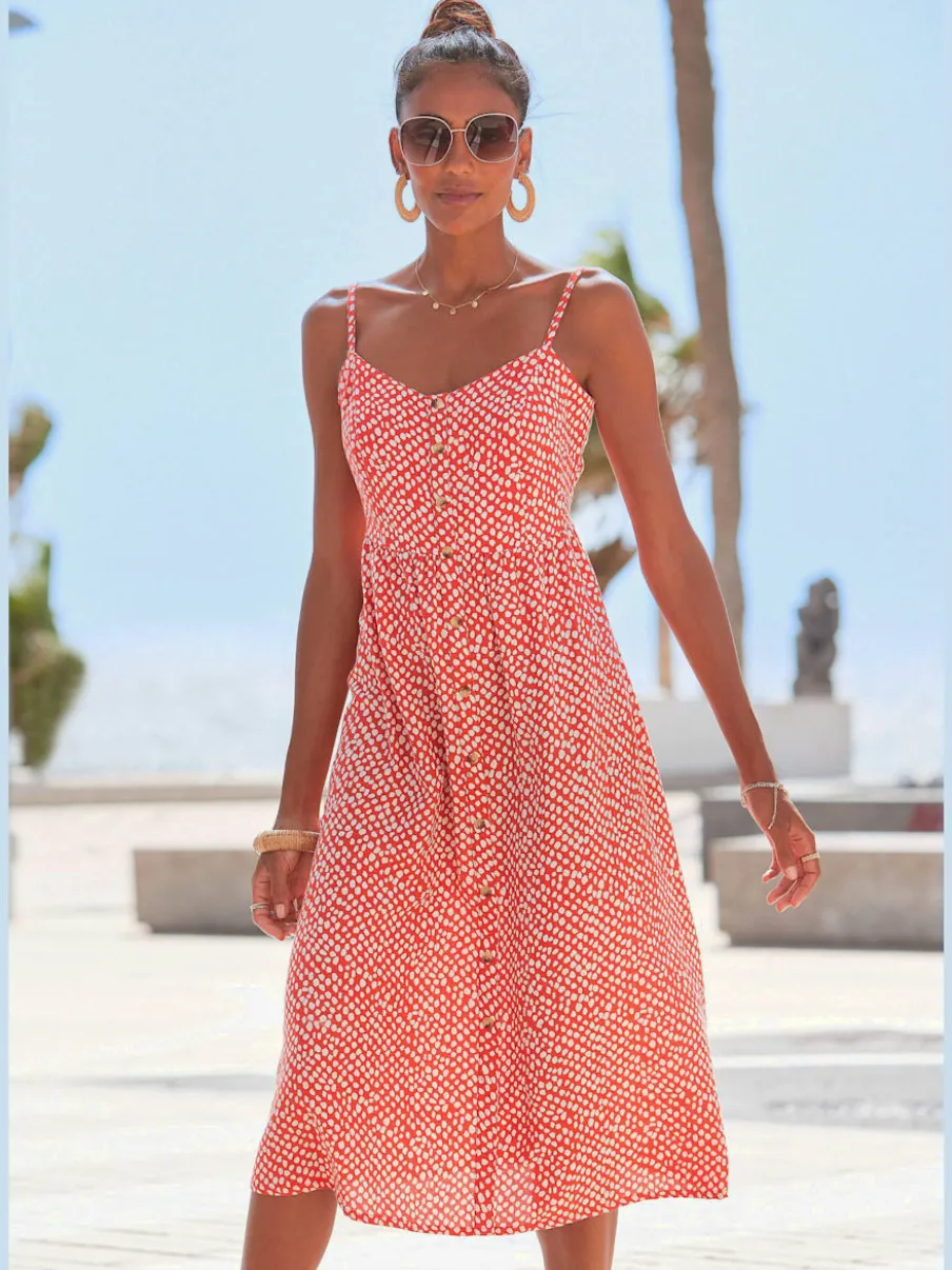 Robe d'été avec bretelles spaghetti et patte boutonnage