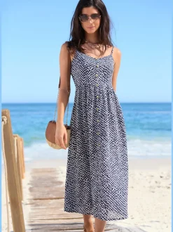 Robe d'été avec bretelles spaghetti et patte de boutonnage