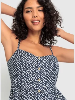 Robe d'été avec bretelles spaghetti et patte de boutonnage