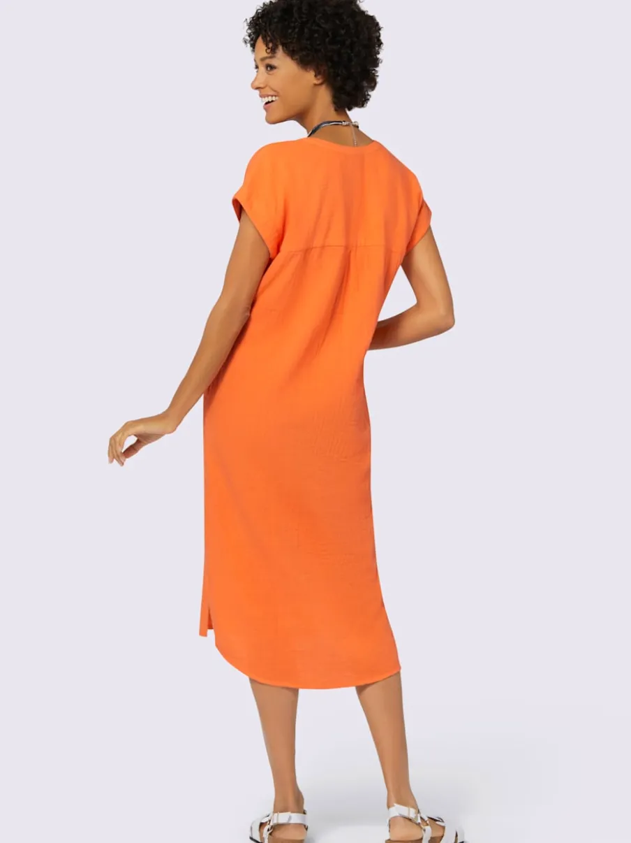 Robe d'été en mousseline avec poches et fentes latérales