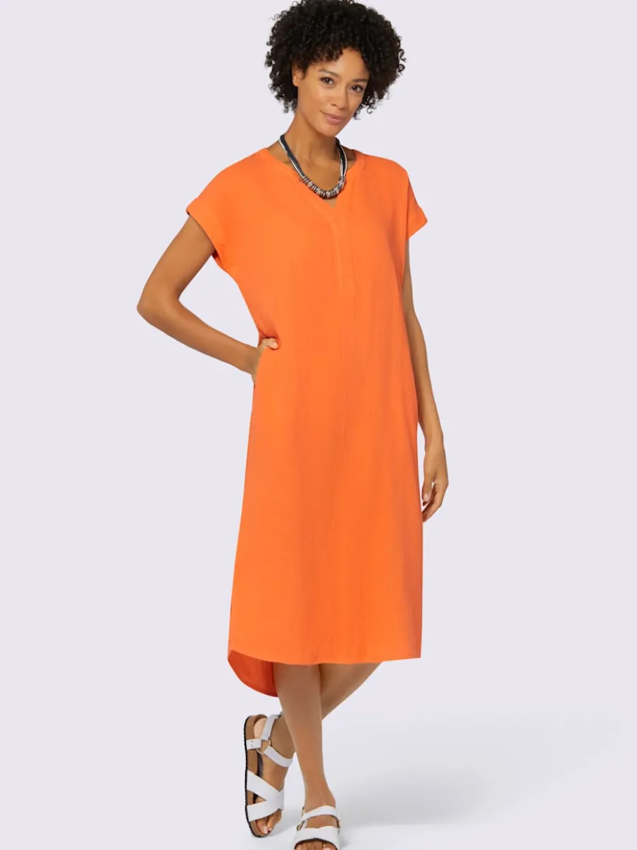 Robe d'été en mousseline avec poches et fentes latérales