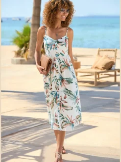 Robe d'été mi-longue sans manches avec bretelles spaghetti et patte de boutonnage