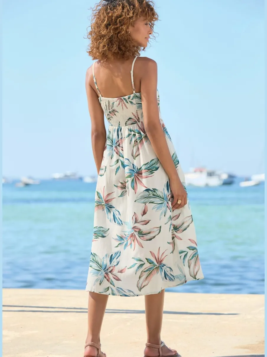 Robe d'été mi-longue sans manches avec bretelles spaghetti et patte de boutonnage