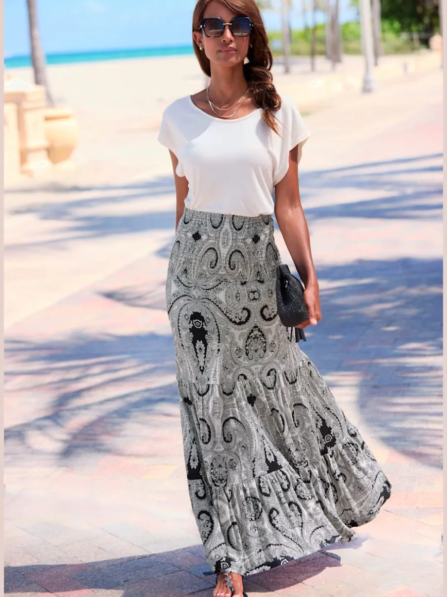 Robe 2 en 1 avec ceinture smockée et jupe volants