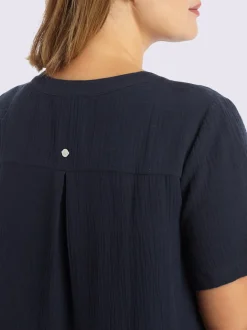 Robe en coton col v avec patte de boutonnage