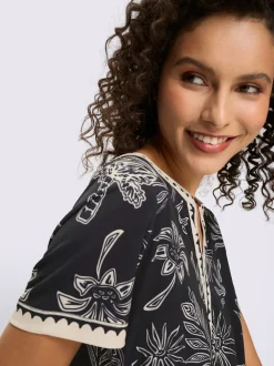 Robe en jersey avec col V et manches courtes à imprimé palmier