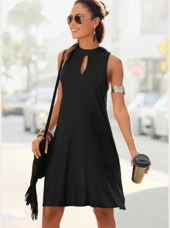 Robe en jersey avec encolure haute et poches latérales