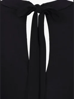 Robe en jersey avec encolure haute et poches latérales