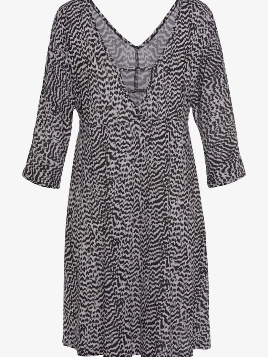 Robe en jersey à col V dégagé avec manches 3/4 fendues