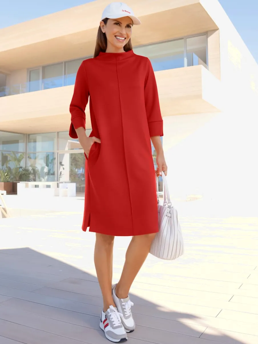 Robe en jersey douce avec col corolle et rayures