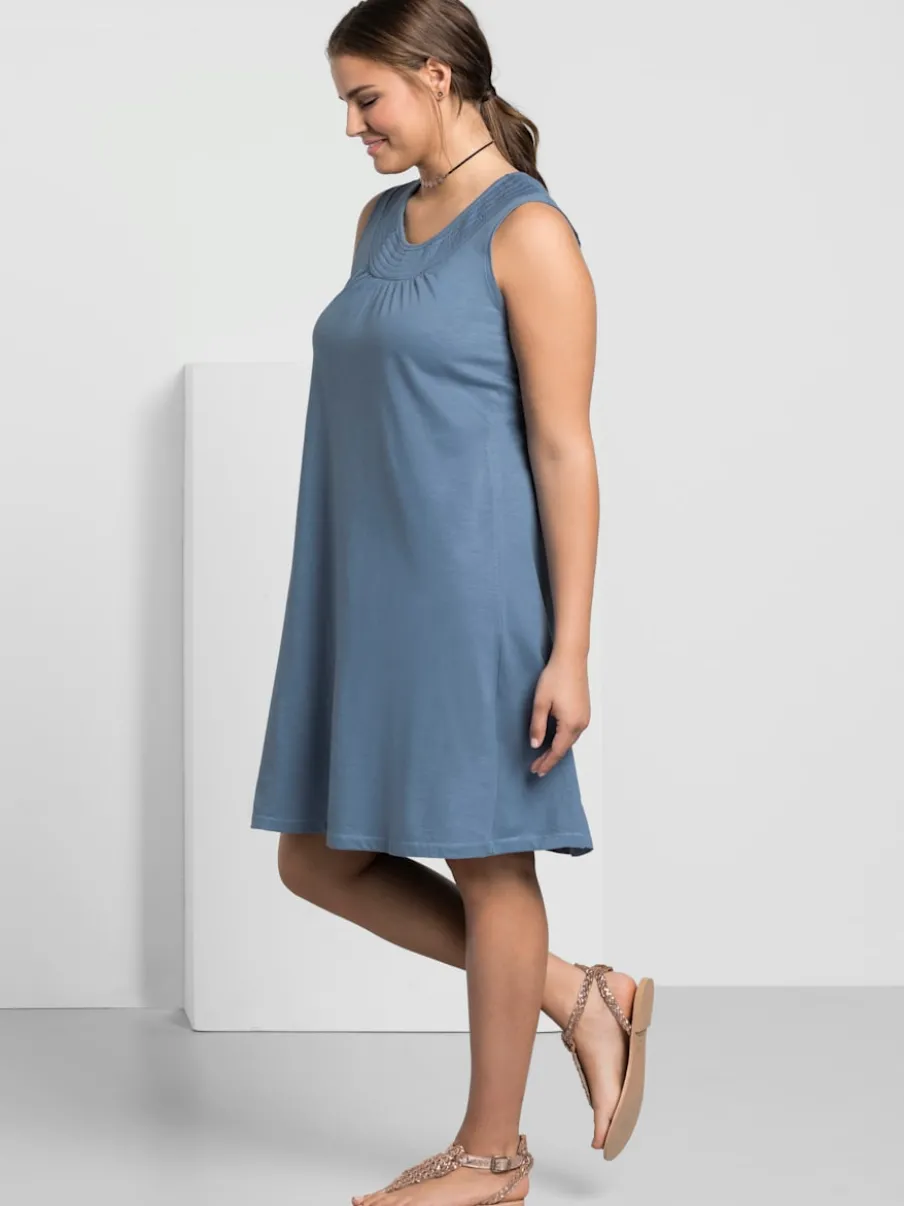 Robe en jersey encolure smockée