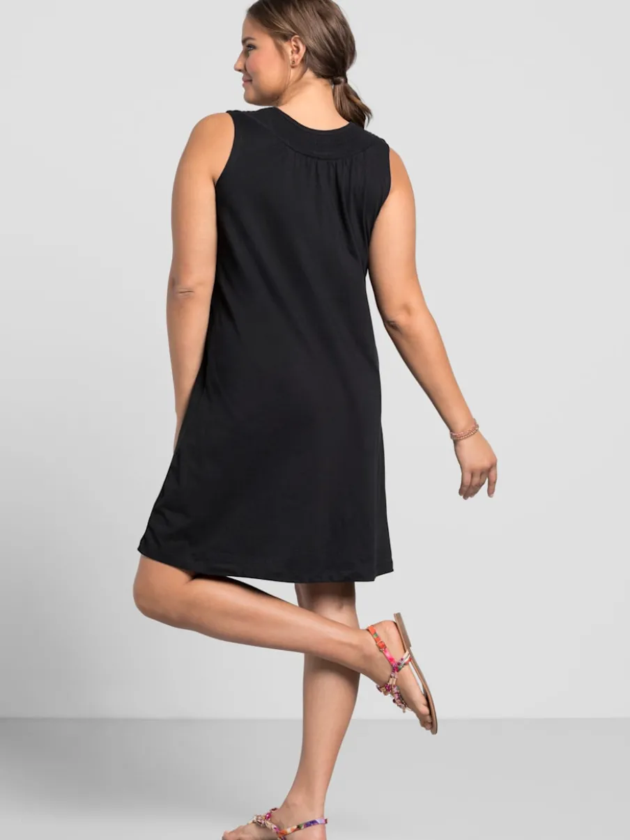 Robe en jersey encolure smockée