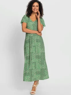 Robe en jersey fluide avec empiècements et manches chauve-souris
