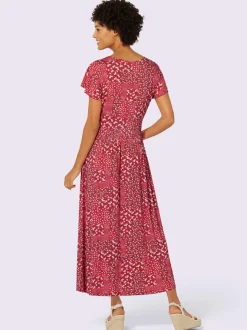 Robe en jersey fluide avec empiècements et manches chauve-souris
