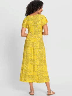 Robe en jersey fluide avec empiècements et manches chauve-souris
