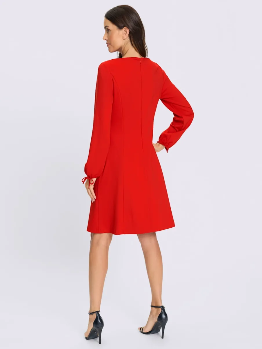 Robe en jersey manches ballon finition cintrée et douce