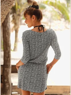 Robe en jersey à manches trois-quarts avec glissière et poches latérales