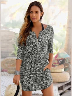 Robe en jersey à manches trois-quarts avec glissière et poches latérales