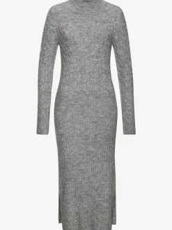 Robe en tricot col montant avec manches longues et jupe fendue