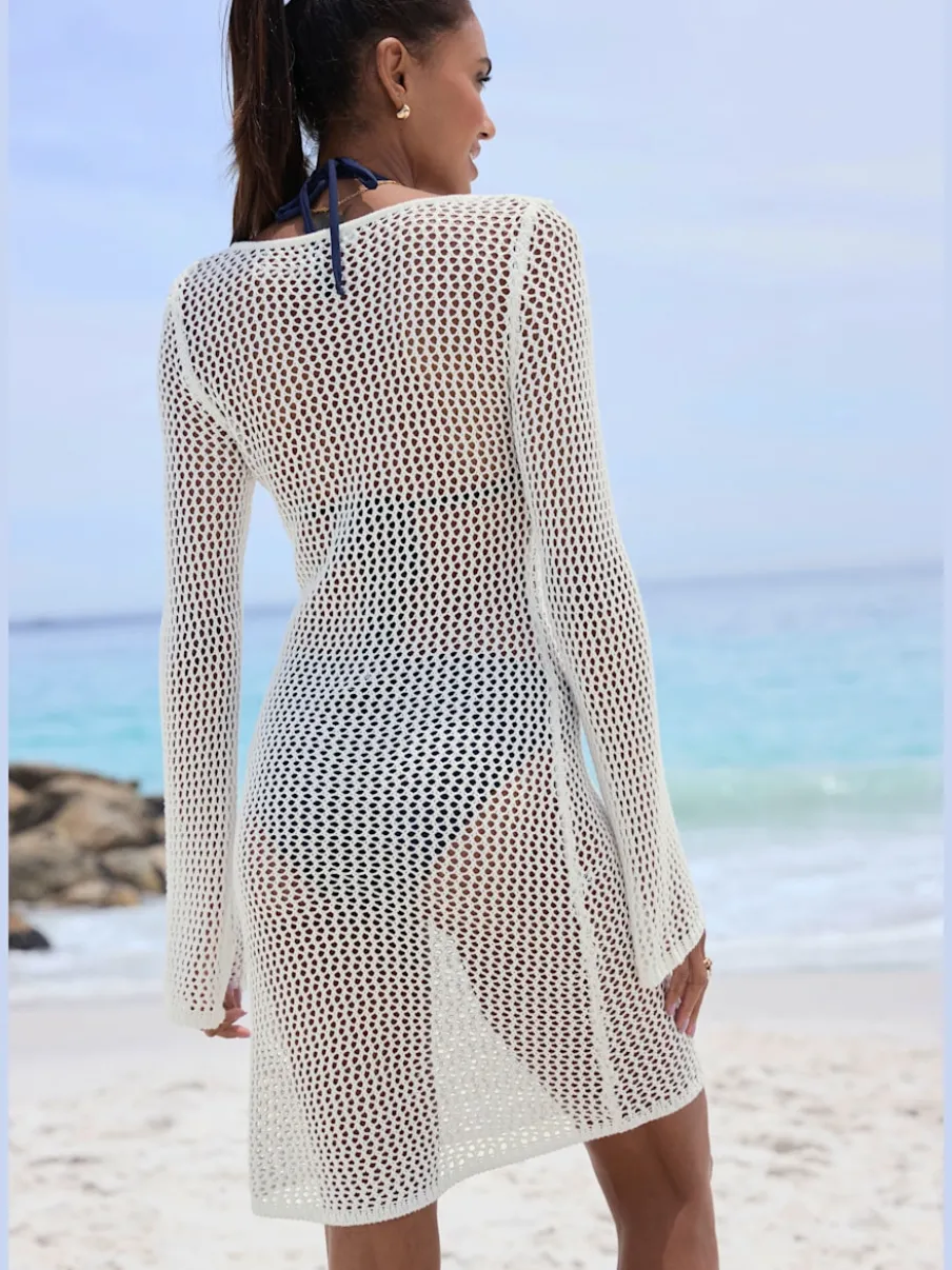 Robe en tricot à encolure ronde et manches longues avec motif ajouré