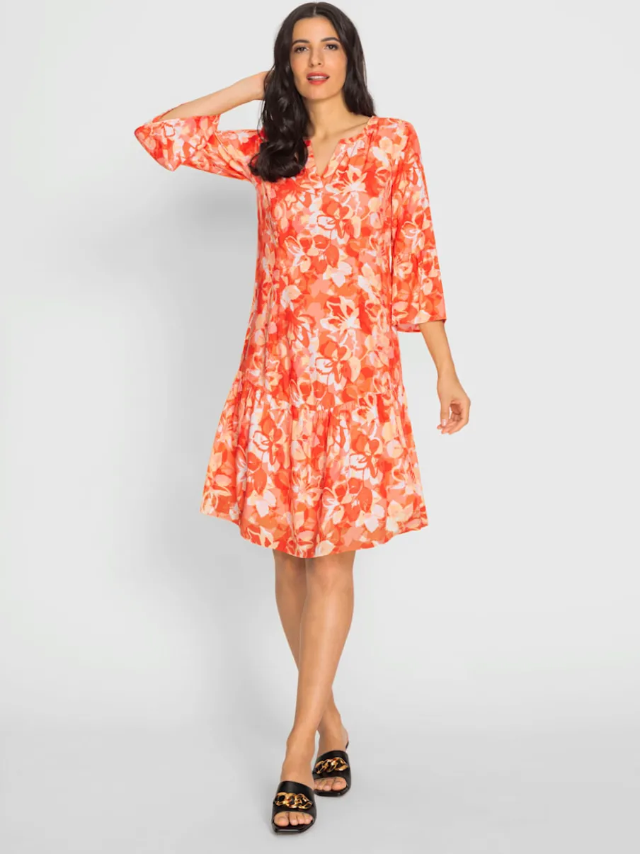 Robe à imprimés floraux avec manches 3/4 volantes
