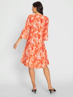 Robe à imprimés floraux avec manches 3/4 volantes