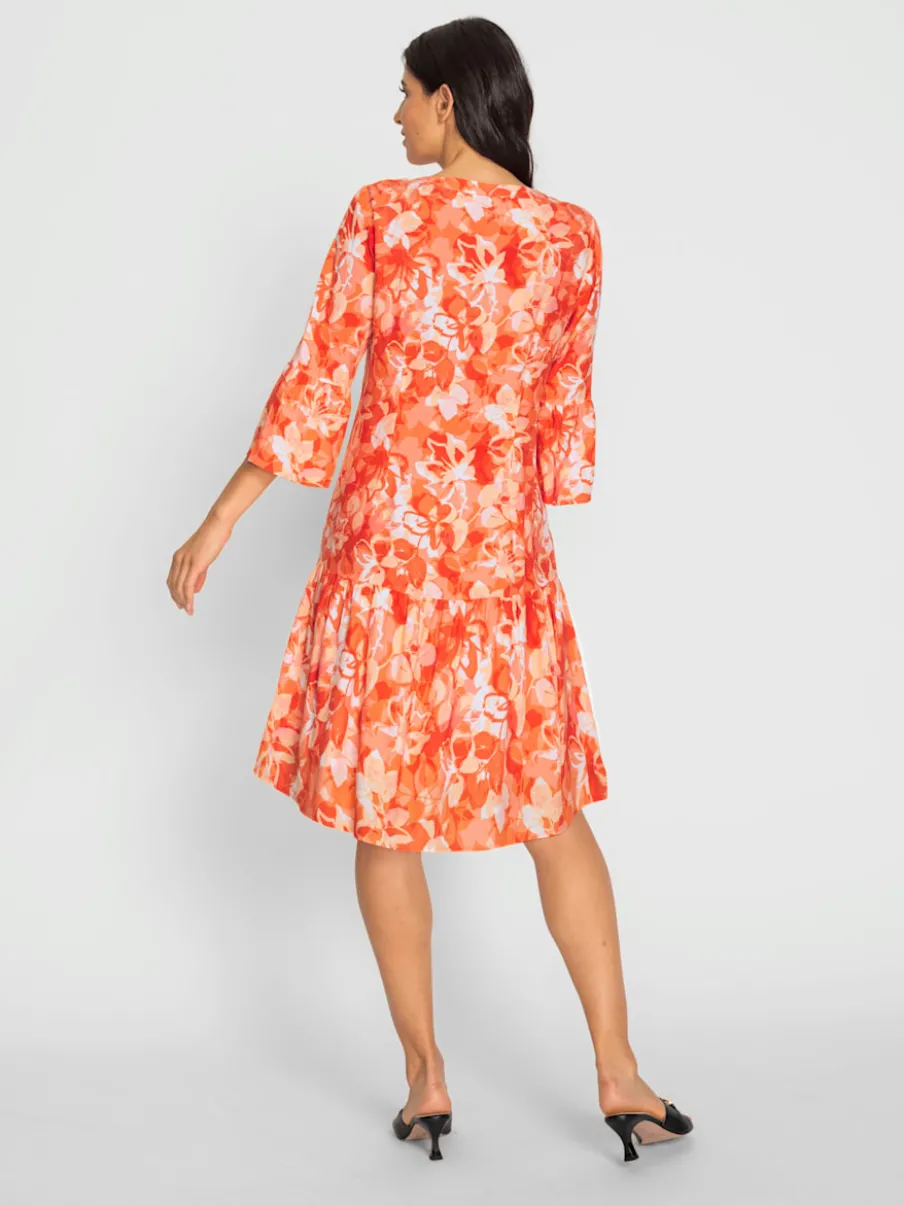 Robe à imprimés floraux avec manches 3/4 volantes