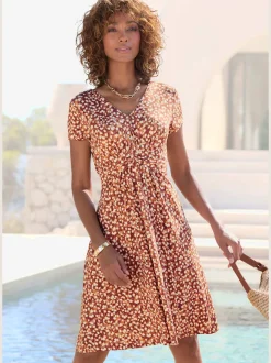 Robe jersey à encolure en V et fronces élégantes