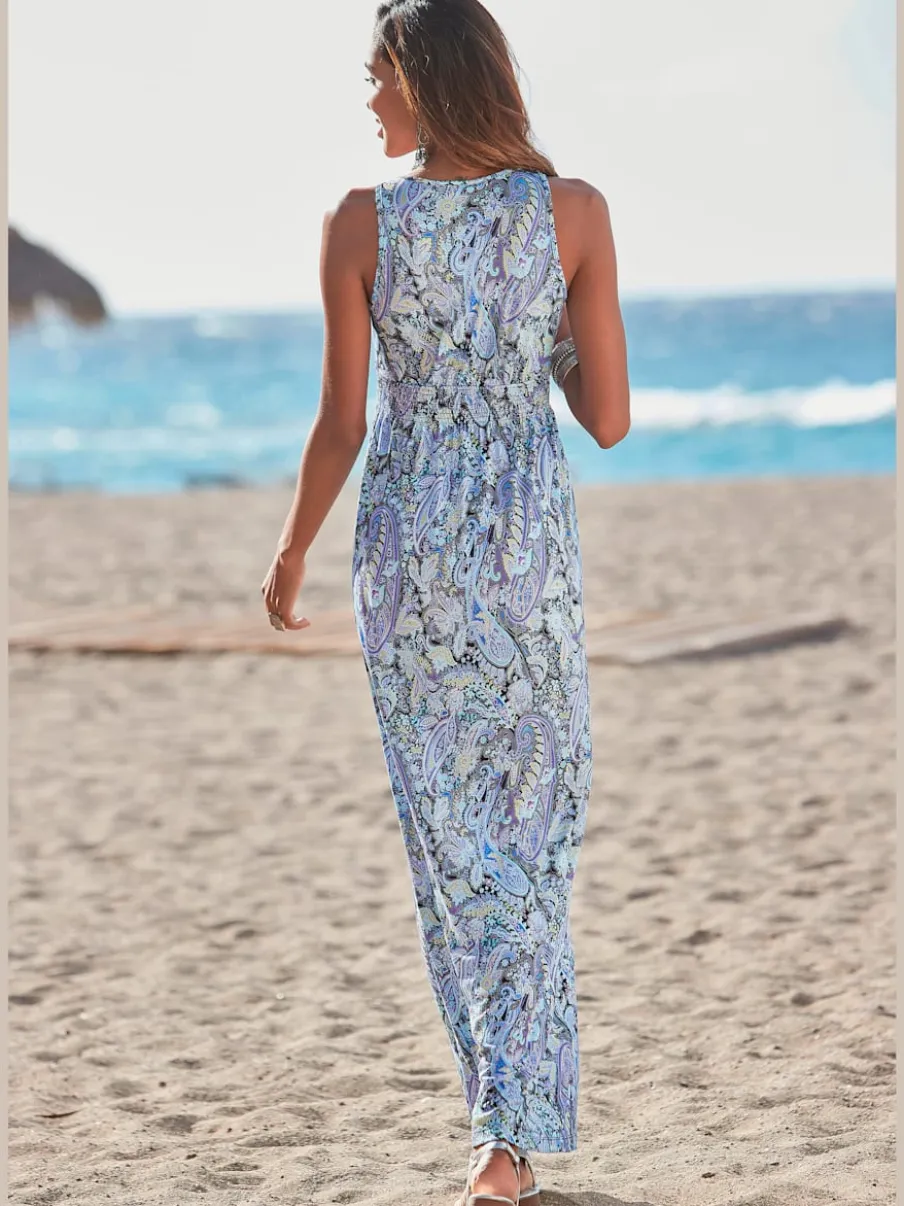 Robe longue avec encolure réglable et motifs floraux fluides