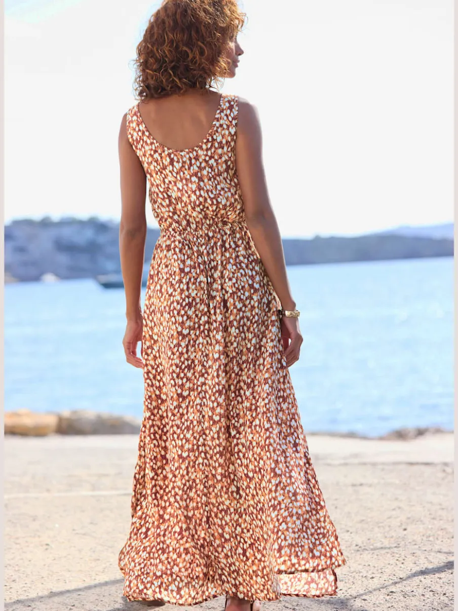 Robe longue avec taille élastiquée et fentes latérales