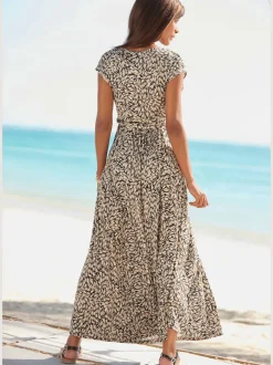 Robe longue encolure cache-cœur avec mancherons et poches