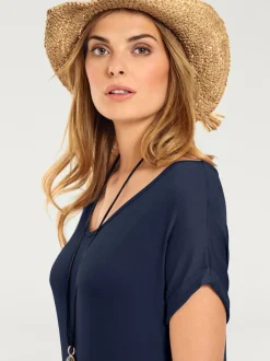Robe longue à encolure V avec manches courtes et poches latérales