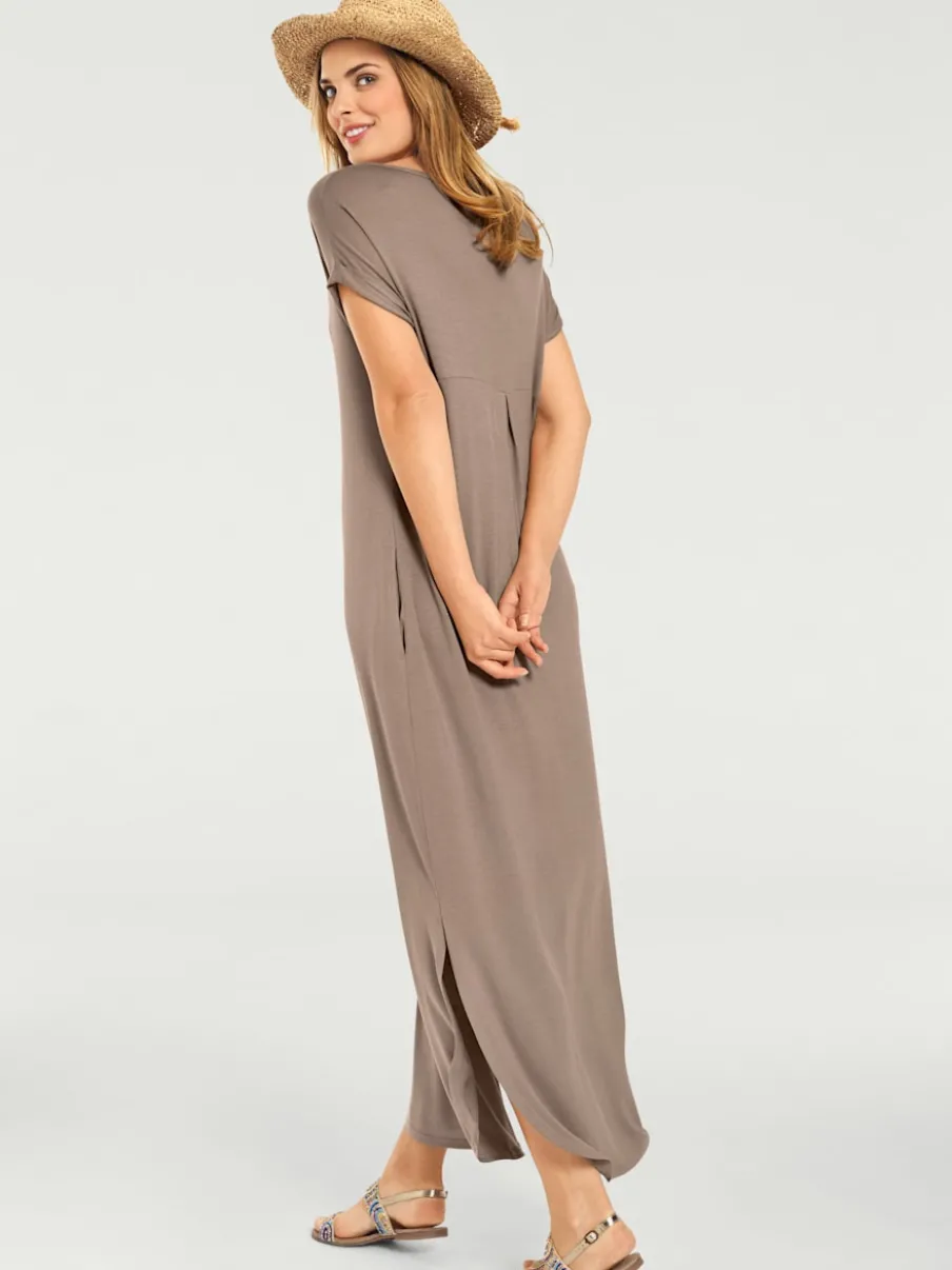 Robe longue à encolure V avec manches courtes et poches latérales