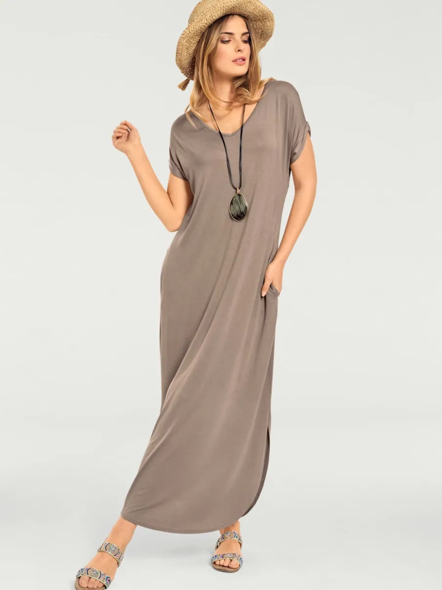 Robe longue à encolure V avec manches courtes et poches latérales