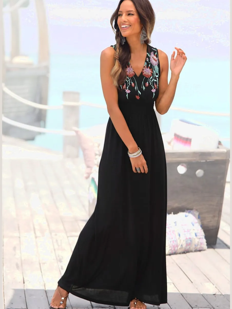 Robe longue encolure V avec motifs brodés sur le devant